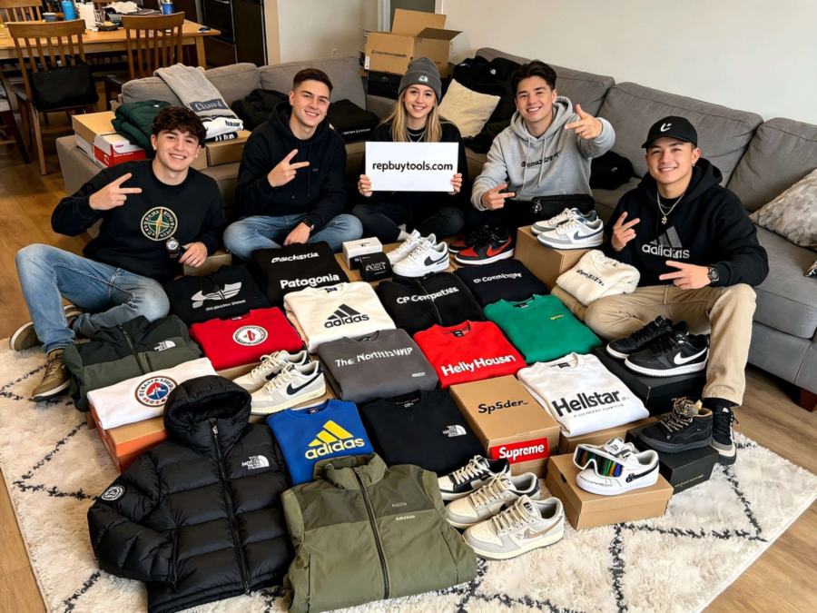 Sweatshirts, jackets, sneaker boxes and trainers laid out across a rug